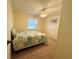 Bedroom with double bed and ceiling fan at 188 Azalea Trl, Leesburg, FL 34748