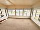 Sunroom with view of community and street at 188 Azalea Trl, Leesburg, FL 34748