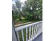 View from balcony showcasing the backyard landscape at 253 N Blue Lake Ave, Deland, FL 32724