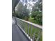 Balcony view of backyard and surrounding trees at 253 N Blue Lake Ave, Deland, FL 32724