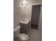 Bathroom with vanity, toilet and flooring at 253 N Blue Lake Ave, Deland, FL 32724