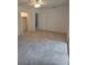 Large bedroom with carpet, double closets, and door to balcony at 253 N Blue Lake Ave, Deland, FL 32724