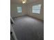 Spacious bedroom with carpet flooring and ceiling fan at 253 N Blue Lake Ave, Deland, FL 32724