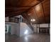 Living room with lofted area and wood-beamed ceiling at 253 N Blue Lake Ave, Deland, FL 32724