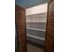 Walk-in pantry with ample shelving for storage at 253 N Blue Lake Ave, Deland, FL 32724