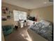 Bedroom with a twin bed, beanbag chair, and dog at 255 Sandlewood Trl # 4, Winter Park, FL 32789