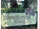 Sandlewood Creek community sign with landscaping at 255 Sandlewood Trl # 4, Winter Park, FL 32789