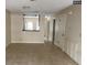 Bright dining room with tile floors and view into kitchen at 255 Sandlewood Trl # 4, Winter Park, FL 32789