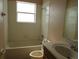 Simple bathroom with shower/tub combo and vanity at 2802 Quiet Water Trl, Kissimmee, FL 34744