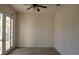 Bright bedroom with French doors leading to the outdoors at 2802 Quiet Water Trl, Kissimmee, FL 34744