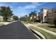 Residential street with two-story houses at 2802 Quiet Water Trl, Kissimmee, FL 34744