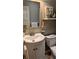 Small bathroom with toilet and vanity at 2809 Bower Rd, Winter Park, FL 32792