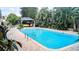 Stunning pool with gazebo and tropical landscaping at 2809 Bower Rd, Winter Park, FL 32792