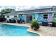 Relaxing pool area with a fun mural and patio at 2809 Bower Rd, Winter Park, FL 32792