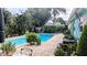 Large, refreshing pool surrounded by lush landscaping at 2809 Bower Rd, Winter Park, FL 32792