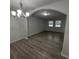 Bright dining room with hardwood floors and elegant chandelier at 325 Garden St, Daytona Beach, FL 32114