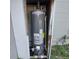 Rheem Performance water heater in protective enclosure at 325 Garden St, Daytona Beach, FL 32114