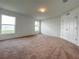 Neutral bedroom with carpet and natural light from the windows at 3556 Elliot Pl, Bartow, FL 33830