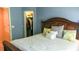 Bedroom with queen-size bed and closet at 4055 Beacon Ridge Way, Clermont, FL 34711