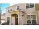 Elegant two-story home featuring a grand entrance at 4055 Beacon Ridge Way, Clermont, FL 34711