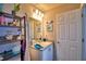 Bathroom with vanity, shelving and a large mirror at 4481 Reding Way, Lakeland, FL 33813