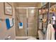 Well-lit bathroom with shower and storage at 4481 Reding Way, Lakeland, FL 33813