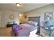 Cozy bedroom with a view and ensuite bathroom access at 4481 Reding Way, Lakeland, FL 33813