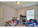 Bedroom with two twin beds and a desk at 4481 Reding Way, Lakeland, FL 33813