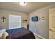 Bedroom with double bed and wall-mounted TV at 4481 Reding Way, Lakeland, FL 33813