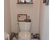 Small half bathroom with toilet at 766 Bryson Loop, Lakeland, FL 33809