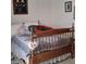 Bedroom with antique wooden bed frame at 766 Bryson Loop, Lakeland, FL 33809