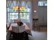 Bright dining room with a table and chairs near a window at 766 Bryson Loop, Lakeland, FL 33809