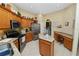 Well-equipped kitchen featuring granite counters, stainless steel appliances, and ample cabinetry at 766 Bryson Loop, Lakeland, FL 33809