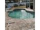 Freeform pool with brick patio and screened enclosure at 766 Bryson Loop, Lakeland, FL 33809