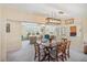 Dining room with view into living room and kitchen at 108 Dogwood Trl, Leesburg, FL 34748