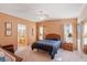 Main bedroom with ensuite bathroom and ample closet space at 108 Dogwood Trl, Leesburg, FL 34748