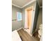 Bathroom featuring shower with shower curtain, toilet and vanity with sink at 100 Papaya Cv, Leesburg, FL 34748