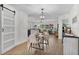 Inviting dining room showcasing open floor plan, dining set and natural light at 1411 Juarez Pl, The Villages, FL 32159