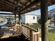 View of the backyard from the covered dock with a shed at 1618 Juno Trail, Astor, FL 32102
