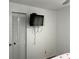 Bedroom featuring a television mounted on the wall at 1618 Juno Trail, Astor, FL 32102