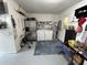 The utility room is equipped with a washer, dryer and additional storage at 1618 Juno Trail, Astor, FL 32102