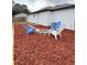 Relaxing backyard with firepit and wood chips at 203 Juniper Way, Ocala, FL 34480
