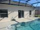 Outdoor space featuring a refreshing pool and adjacent patio at 2410 Shelby Cir, Kissimmee, FL 34743