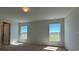 Bedroom with neutral carpet, lots of natural light from the windows at 277 Harper Estates Cir, Lake Wales, FL 33859