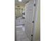 Bright bathroom with white cabinets and tiled floors at 3362 Sebastion Ave, The Villages, FL 32163