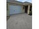 White double-car garage door with concrete driveway at 3362 Sebastion Ave, The Villages, FL 32163