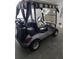 Grey Yamaha golf cart with custom seats and top at 3362 Sebastion Ave, The Villages, FL 32163