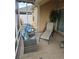 Relaxing screened patio with lounge chair and seating at 3362 Sebastion Ave, The Villages, FL 32163
