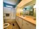 Clean bathroom with a tub shower combo and updated vanity at 408 Hawthorne Blvd, Leesburg, FL 34748
