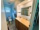 Clean bathroom with a vanity and shower/tub combo at 408 Hawthorne Blvd, Leesburg, FL 34748